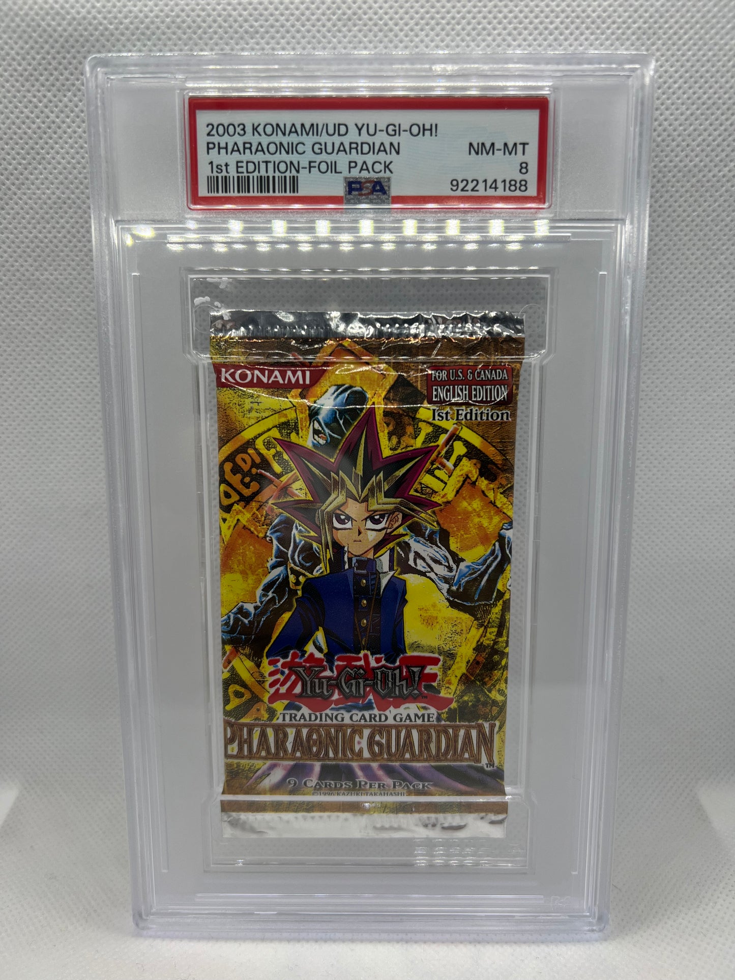 1st Edition Yu-Gi-Oh! Pharaonic Guardian Booster Pack PSA 8